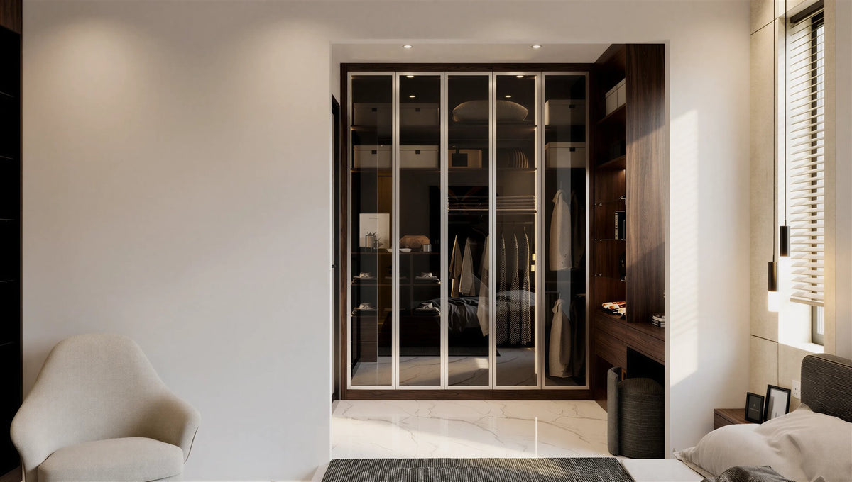 Glass fitted wardrobe — champagne aluminium frames with smoked glass and lit walnut interior