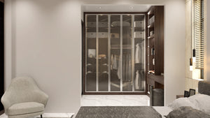 Knightsbridge glass fitted wardrobe in London: silver aluminium frames with smoked toughened glass over a lit walnut alcove interior