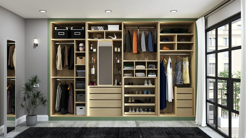 Notting Hill fitted wardrobe in London with the doors open: lit oak interior with hanging, shelving, shoe shelves and drawers behind the glass bay