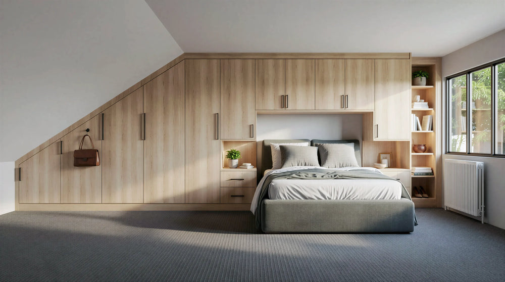 Suffolk bespoke loft fitted wardrobe with floor-to-ceiling storage for a sloping ceiling bedroom in London by Metro.