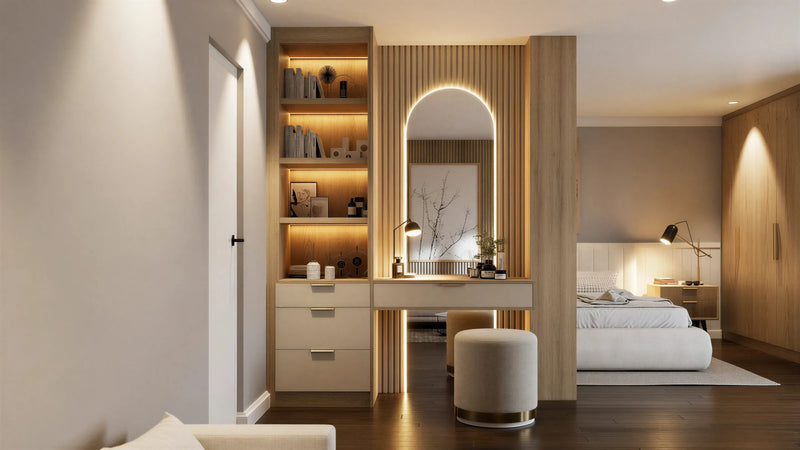 Bayswater dressing table in London: cream drawers and a lit arched mirror built into a slatted light oak partition with a lit shelving column, screening the dressing area from the bed. Made to measure by Metro Home Interiors