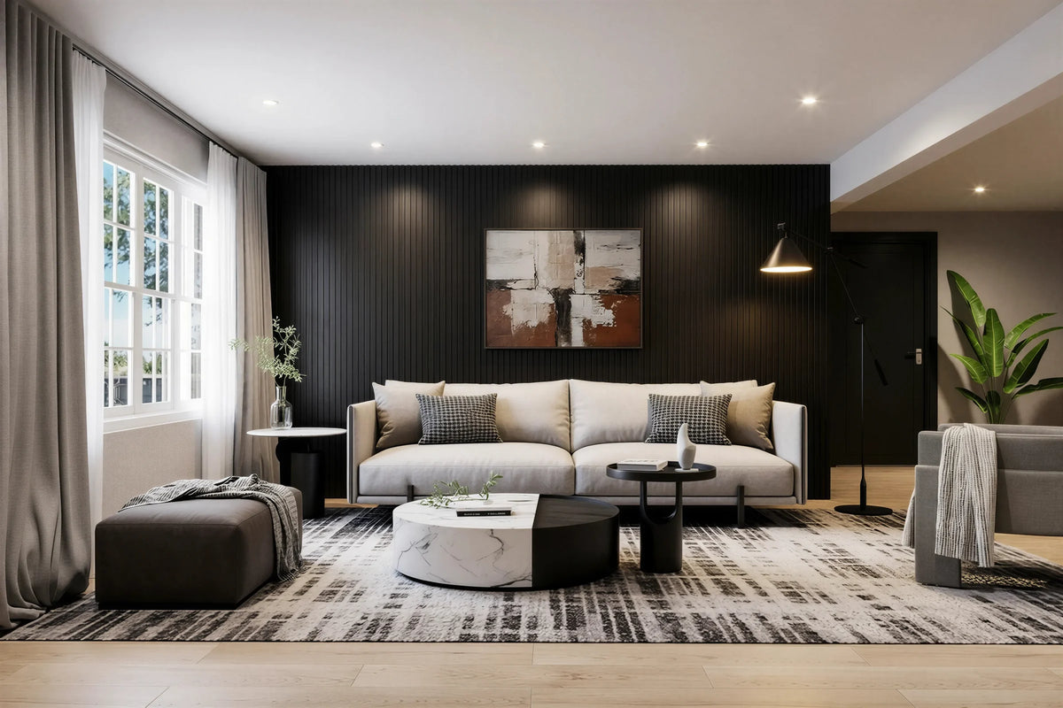 Brook black oak slatted wall panel in London: floor-to-ceiling black oak slats across the whole sofa wall of a bright living room, with a pale sofa, a painting and a bay window. Made to measure by Metro Home Interiors