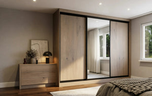 Canterbury Woodgrain Sliding Wardrobe in London, Full Panel door layout: light oak woodgrain doors with black profiles and mirror options, made to measure by Metro Home Interiors