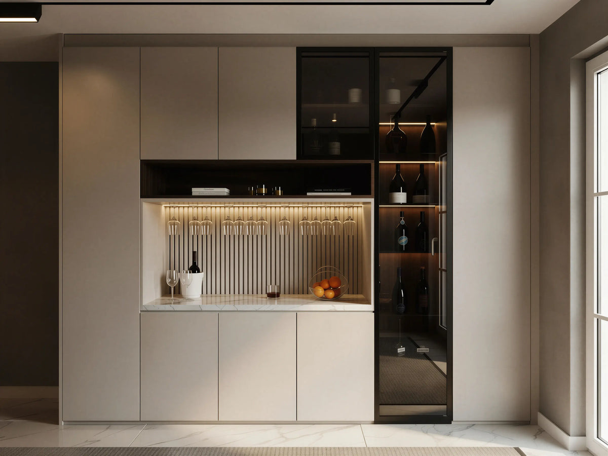Clarendon Bespoke Bar Unit in Cashmere Matt with a white marble-effect worktop, smoked glass display cabinet, black aluminium frame, integrated LED lighting and bespoke home bar storage by Metro Home Interiors in London. 