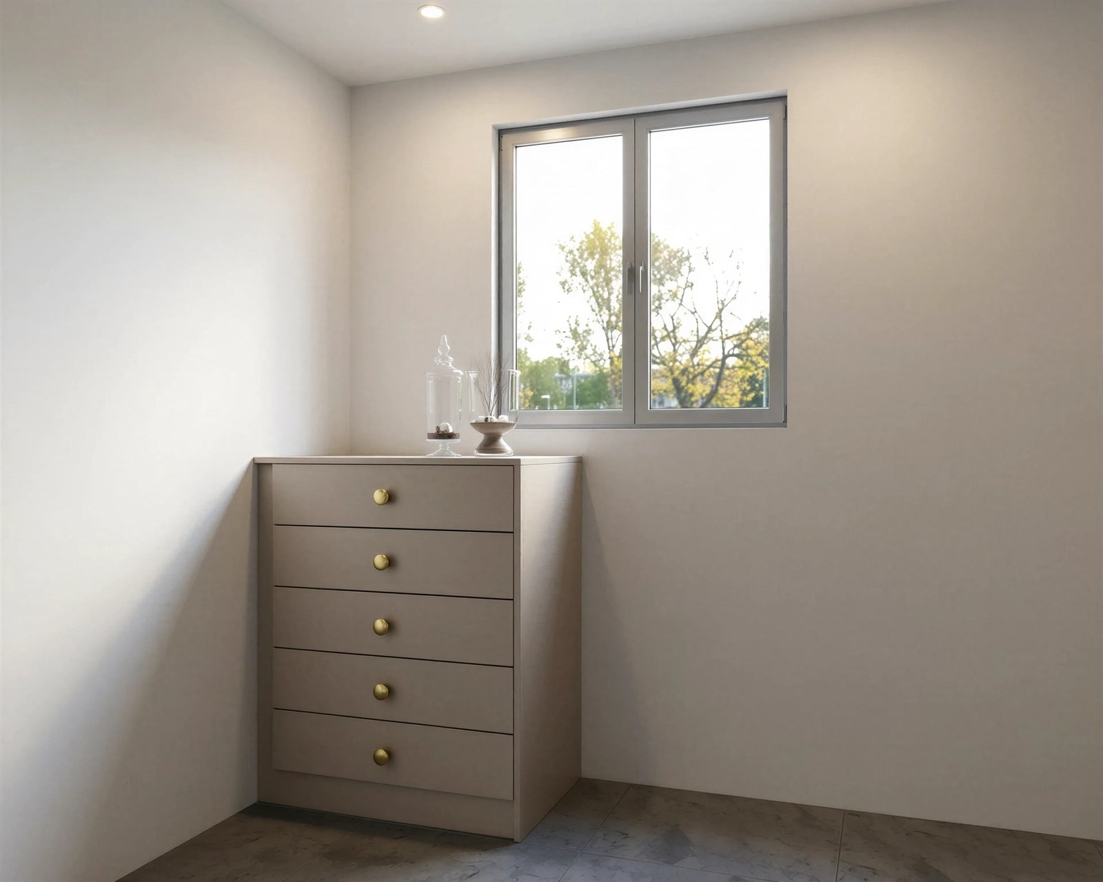 Ealing tallboy: a narrow five-drawer chest in taupe with brass knobs in a bedroom corner