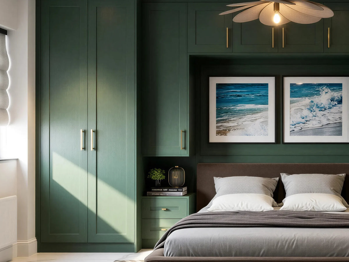 Edison door detail: forest green painted solid ash Edison beaded shaker doors with brass bar handles, on a made-to-measure fitted wardrobe in London by Metro Home Interiors