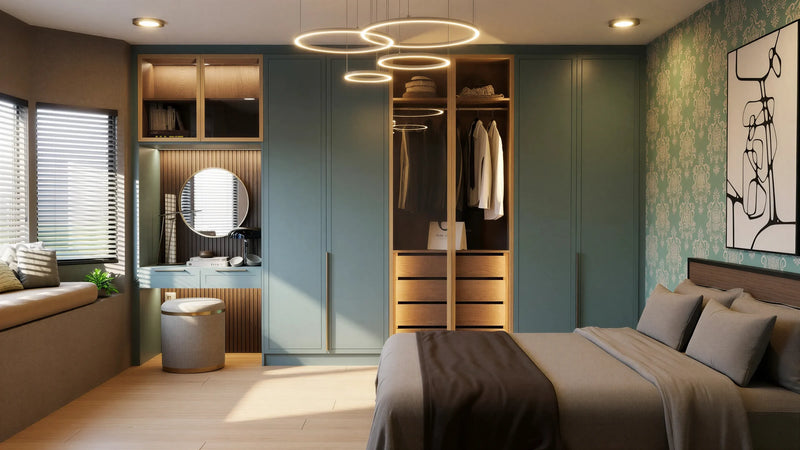Genevieve fitted bedroom furniture in London: taupe wardrobes with glazed display doors, lit shelving, a round-mirror dressing table and a window seat; the room from the bed: wardrobes, dressing table and window seat under the ring lights. Made to measure by Metro Home Interiors