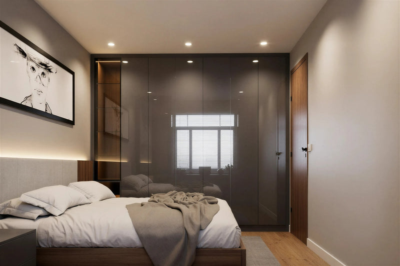Grey gloss fitted wardrobes around a bed — Galaxy doors