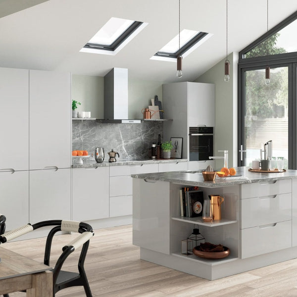 Rana handleless door with a full-height finger groove in light grey gloss, shown fitted in a room wardrobe door
