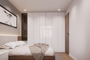 The Alaska handleless fitted wardrobe — J-pull doors in Pure White matt