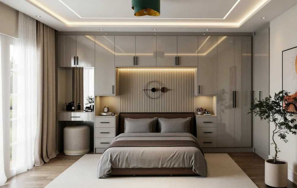 High gloss fitted wardrobe in light grey wrapping the bed wall, with a dressing table, lit fluted headboard panel and slim black handles, made to measure in London