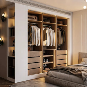 Isadora fitted bedroom furniture in London: cashmere sliding wardrobe doors with a mirror panel, lit open shelving, a fitted desk and a window seat; the sliding wardrobe open, with lit hanging, shelves and drawers. Made to measure by Metro Home Interiors