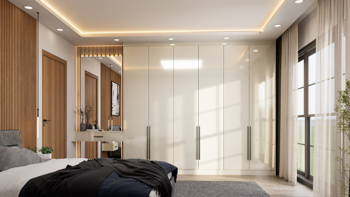 Ivory high gloss fitted wardrobe with six full-height doors and slim black bar handles, beside a floating dressing table and lit mirror in an oak-slat recess, made to measure in London