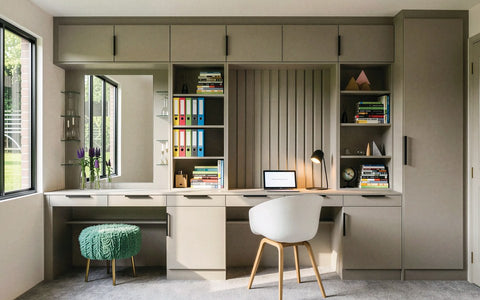 Sage green fitted home office with a long desk under the window, made to measure in London