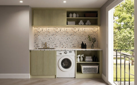 Sage green fitted laundry room with a terrazzo splashback, made to measure in London
