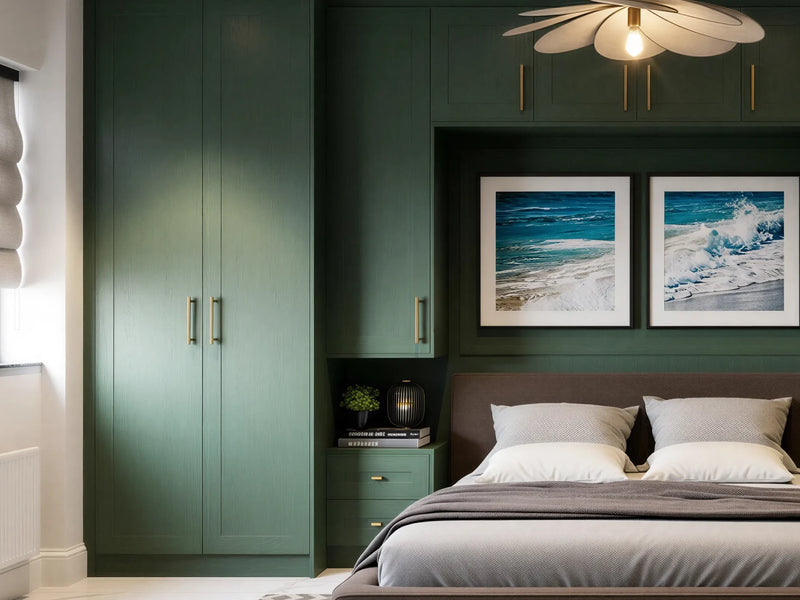 Monroe door detail: forest green painted solid ash Monroe shaker doors with brass bar handles, on a made-to-measure fitted wardrobe in London by Metro Home Interiors