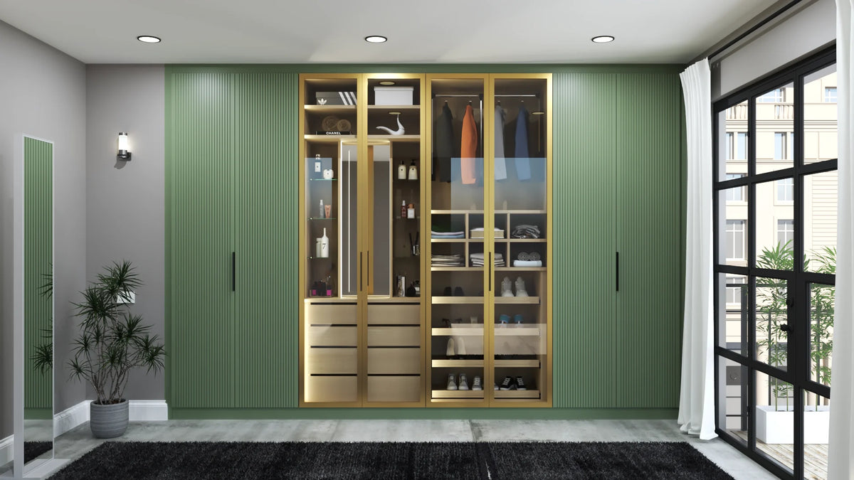 Notting Hill fitted wardrobe in London: sage green fluted doors either side of a lit glass display bay in gold aluminium frames, doors closed
