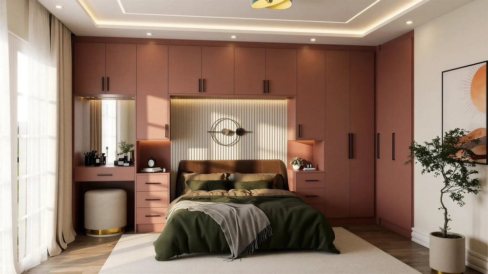 Sandringham over-bed wardrobe in London: terracotta matt slab towers and bridge with matt black bar handles, a lit slatted headboard panel, bedside drawers and a built-in dressing table with mirror. Made to measure by Metro Home Interiors