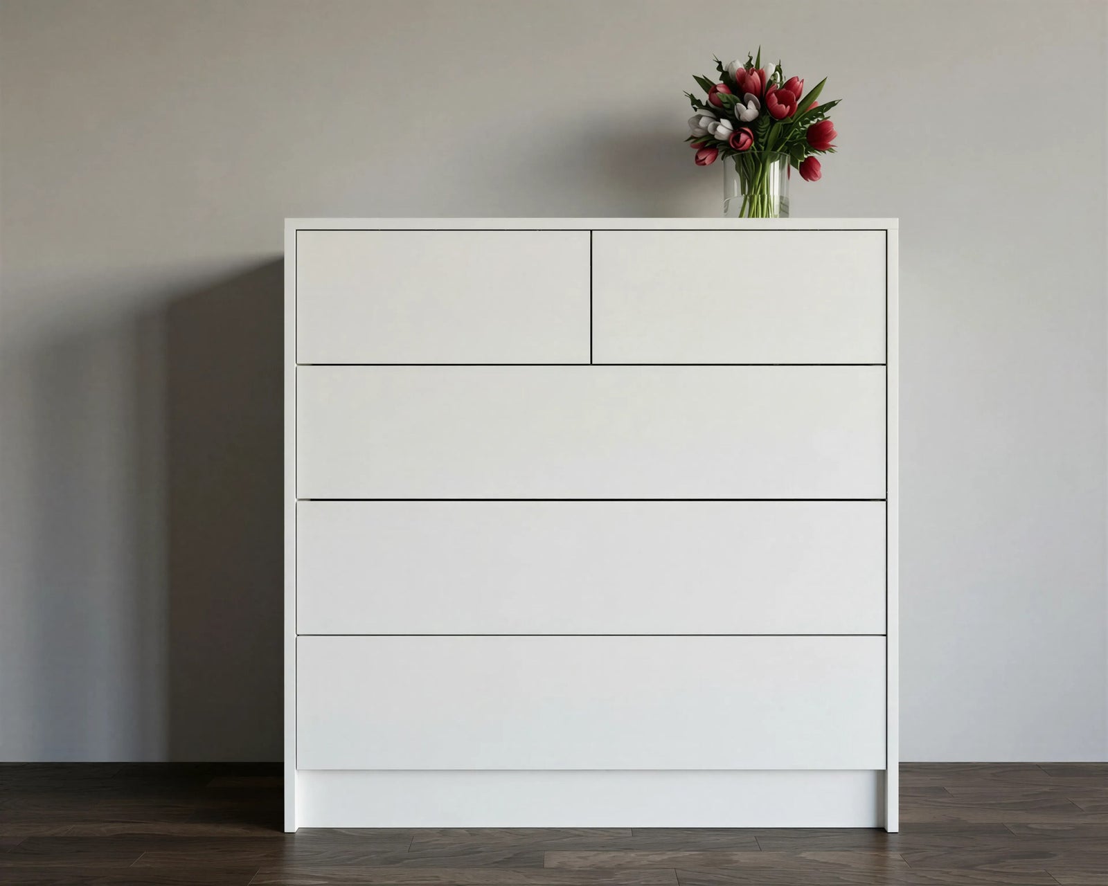Seryn chest of drawers: a white handleless chest with two small drawers over three wide drawers